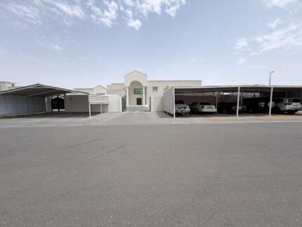 Renovated villa street view with carports in Al Amerah, Al Ain