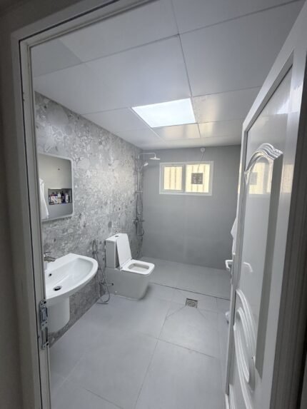 Bathroom after full renovation including new plumbing, tiling and fixtures