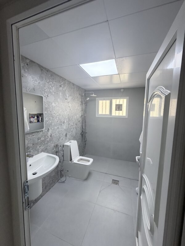 Bathroom after full renovation including new plumbing, tiling and fixtures