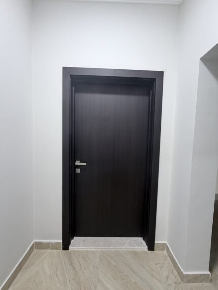 Modern flush WPC door installed in Al Ain villa renovation project